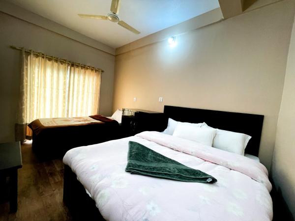 Yuriko Guest House : photo 2 de la chambre chambre double ou lits jumeaux - vue sur lac