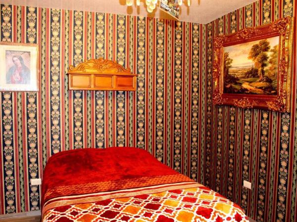 Hotel Temático Casa Puebla : photo 6 de la chambre chambre double avec 2 lits doubles