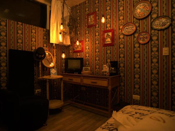 Hotel Temático Casa Puebla : photo 8 de la chambre chambre double avec 2 lits doubles