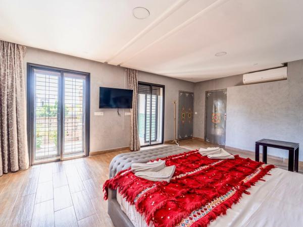 Riad Les Nuits De Fès : photo 1 de la chambre chambre deluxe (2 adultes + 1 enfant)