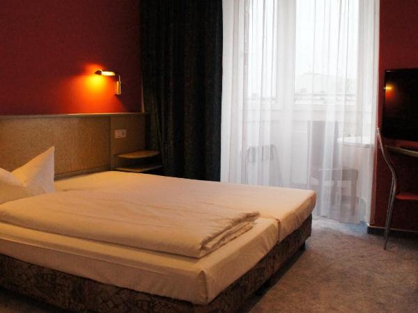 Hotel am Buschkrugpark : photo 1 de la chambre chambre simple