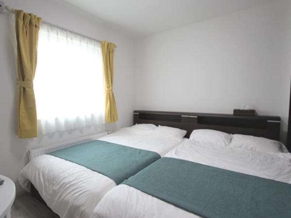 TEINE WHITE HOUSE : photo 6 de la chambre suite 3 chambres