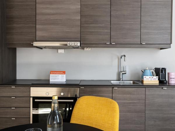 numa l Topp Apartments : photo 4 de la chambre large studio with kitchen - single bed, accessible