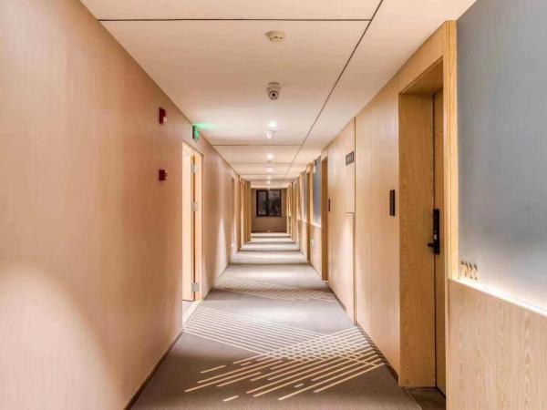 Chaoman Hotel -Guangzhou Shijing City Plaza Xiaoping Subway Station : photo 3 de la chambre chambre lits jumeaux deluxe