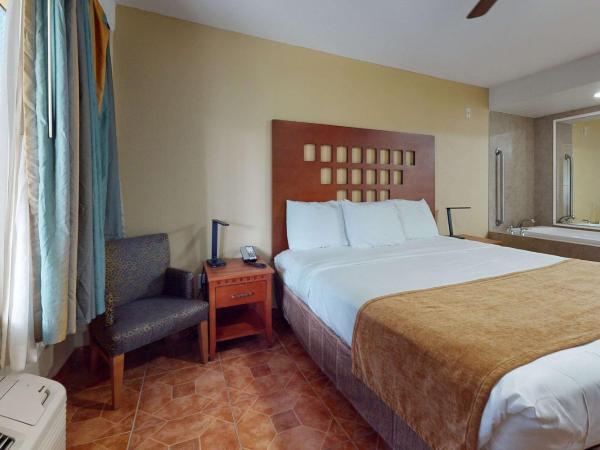 Rodeway Inn & Suites Fort Lauderdale Airport & Cruise Port : photo 3 de la chambre chambre king avec jacuzzi de luxe - non-fumeurs