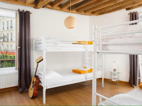 Le Village Montmartre by Hiphophostels : photo 2 de la chambre lit dans dortoir pour femmes de 4 lits