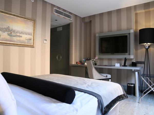 Ramada Hotel & Suites by Wyndham Istanbul- Sisli : photo 1 de la chambre chambre supérieure