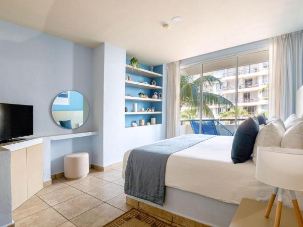 Ixchel Beach Hotel : photo 4 de la chambre suite 1 chambre avec vue sur l'océan ou le jardin