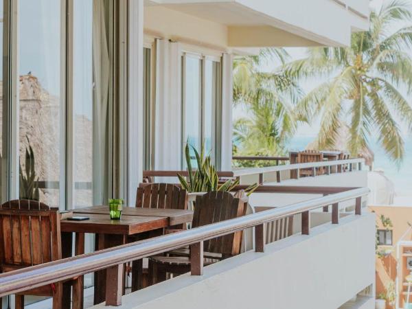 Ixchel Beach Hotel : photo 9 de la chambre suite 1 chambre avec vue sur l'océan ou le jardin