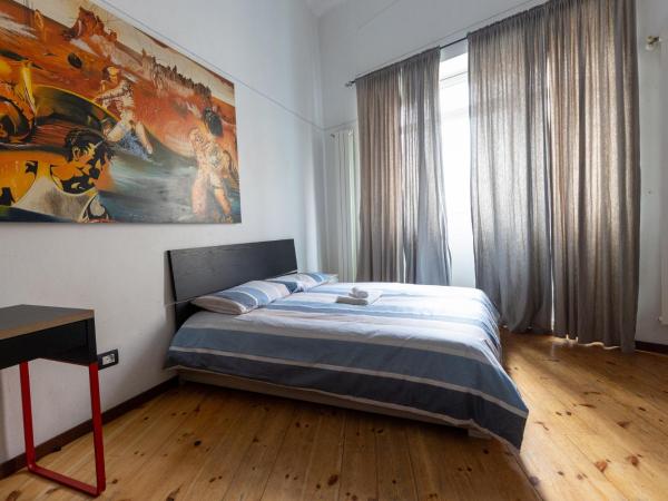 camera monolocale : photo 3 de la chambre grande chambre double