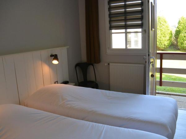 Hotel Nuit Et Jour - La Maison de Lucile : photo 5 de la chambre chambre lits jumeaux standard - vue sur rue