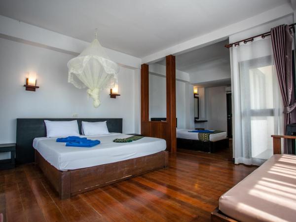Phitharom PP Resort : photo 1 de la chambre chambre triple