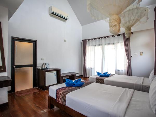 Phitharom PP Resort : photo 4 de la chambre chambre lits jumeaux deluxe
