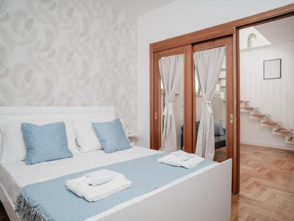 Vista Napoli Residence by Casa Napoletana : photo 9 de la chambre appartement - vue sur jardin