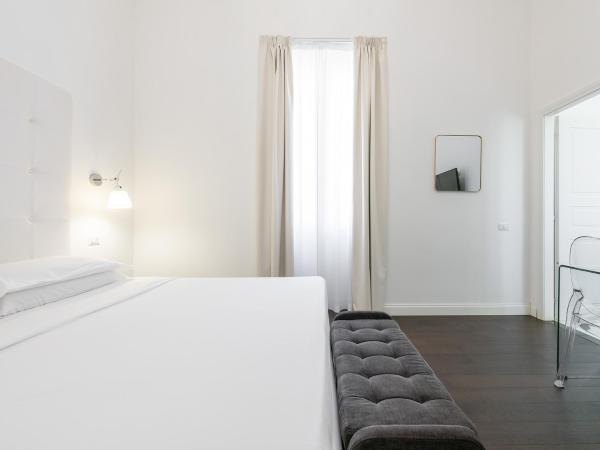 PLEY Cagliari Boutique Suites : photo 2 de la chambre chambre lit king-size