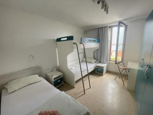 Hostel Pipištrelo : photo 1 de la chambre chambre triple - vue sur mer