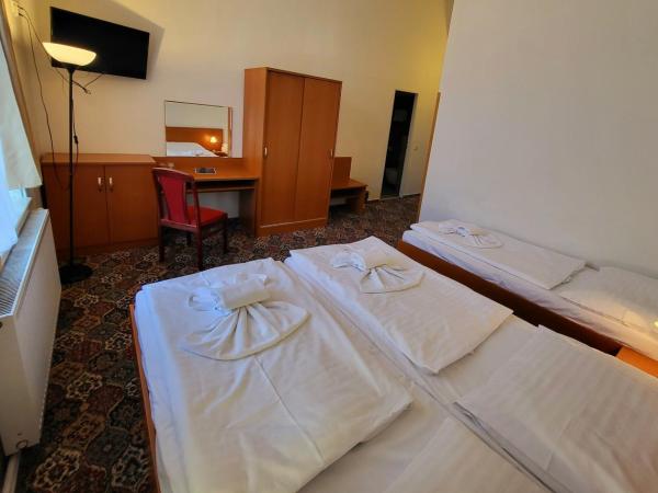 City-Inn : photo 2 de la chambre chambre triple