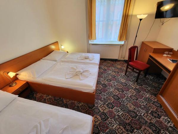 City-Inn : photo 3 de la chambre chambre triple