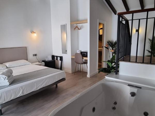 Vitium Córdoba : photo 2 de la chambre chambre lit queen-size avec baignoire spa