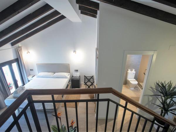 Vitium Córdoba : photo 4 de la chambre chambre lit queen-size avec baignoire spa