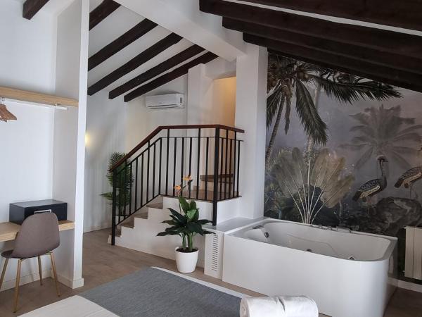 Vitium Córdoba : photo 6 de la chambre chambre lit queen-size avec baignoire spa