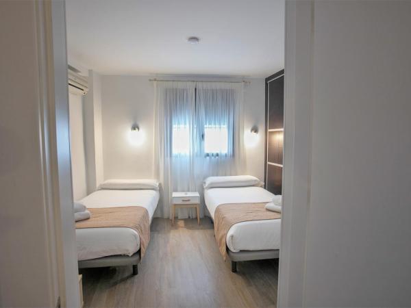 Vitium Córdoba : photo 4 de la chambre chambre quadruple