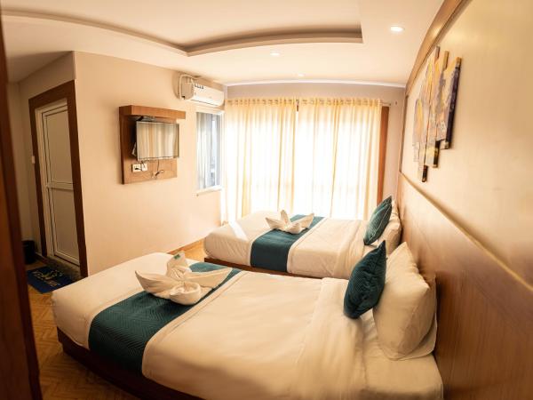 Majheri Resort and Spa : photo 1 de la chambre chambre lits jumeaux deluxe