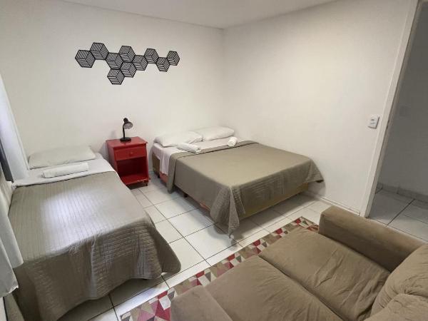 Social Hostel Café e Bar : photo 3 de la chambre chambre triple basique avec salle de bains commune