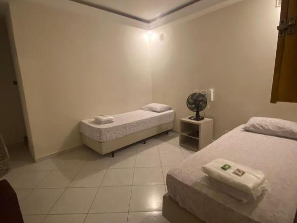Namorata Expo Inn : photo 2 de la chambre chambre lits jumeaux avec ventilateur