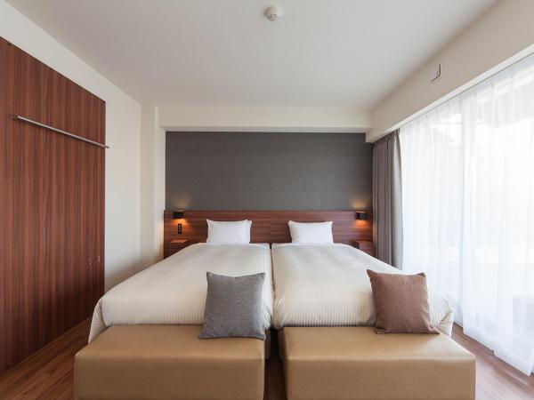 Sakura Terrace The Gallery : photo 2 de la chambre chambre lits jumeaux sur le toit avec balcon - aile nord