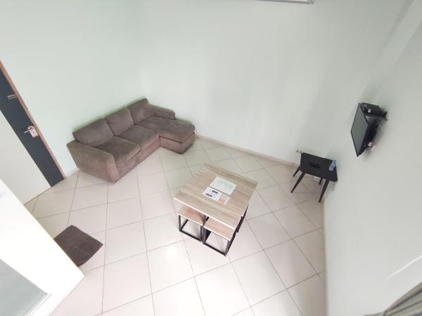 Urbanest Inn House TB Simatupang : photo 6 de la chambre suite exécutive