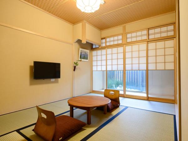 Luck You Kyoto : photo 1 de la chambre chambre triple - vue sur jardin