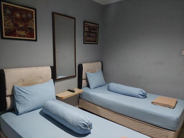 Pondok Seruni Kemanggisan Jakarta : photo 4 de la chambre chambre lits jumeaux standard