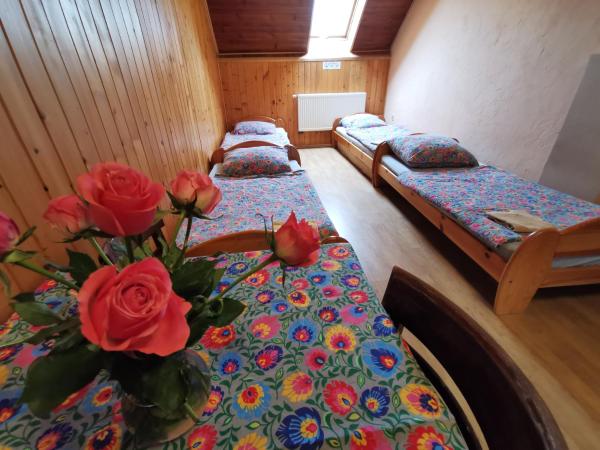 NOCLEGI POD STODOŁĄ : photo 1 de la chambre chambre quadruple