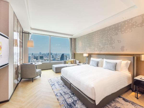 Eastin Grand Hotel Phayathai : photo 1 de la chambre hébergement deluxe avec accès au salon