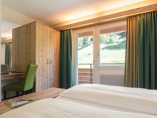 Hotel Restaurant Alpina : photo 1 de la chambre chambre lits jumeaux standard