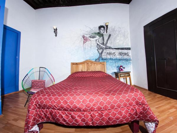 Gente de Más Hostel : photo 3 de la chambre chambre double