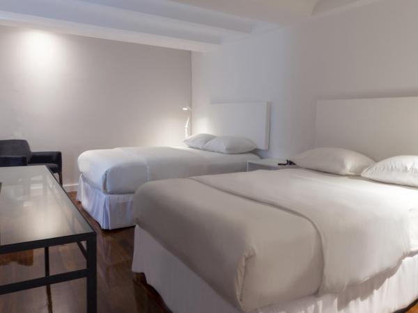Palacio Julio Hotel : photo 5 de la chambre chambre double supérieure avec deux lits doubles