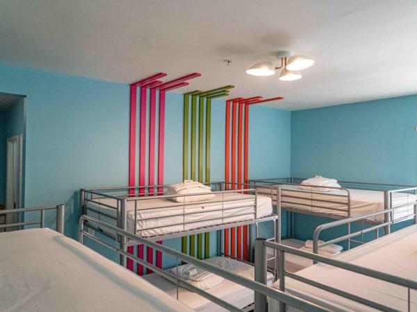 Beds n' Drinks : photo 1 de la chambre lit simple dans dortoir pour femmes de 8 lits