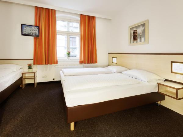 Hotel Goldene Krone Innsbruck : photo 2 de la chambre chambre triple
