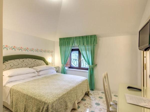 Hotel La Badia : photo 3 de la chambre petite chambre double ou lits jumeaux