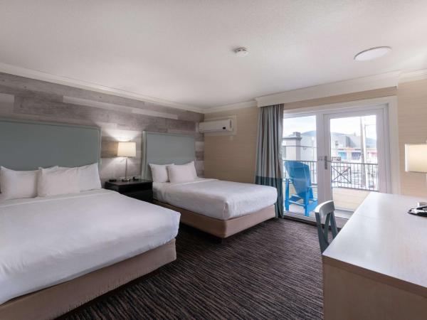 Prestige Beach House, WorldHotels Crafted : photo 1 de la chambre chambre avec 2 lits queen-size et balcon