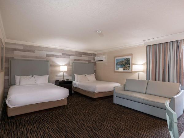 Prestige Beach House, WorldHotels Crafted : photo 1 de la chambre chambre avec 2 lits queen-size et canapé-lit