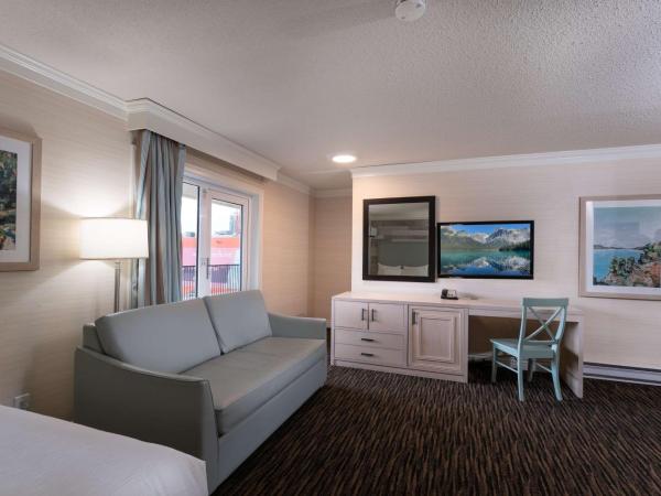 Prestige Beach House, WorldHotels Crafted : photo 2 de la chambre chambre avec 2 lits queen-size et canapé-lit