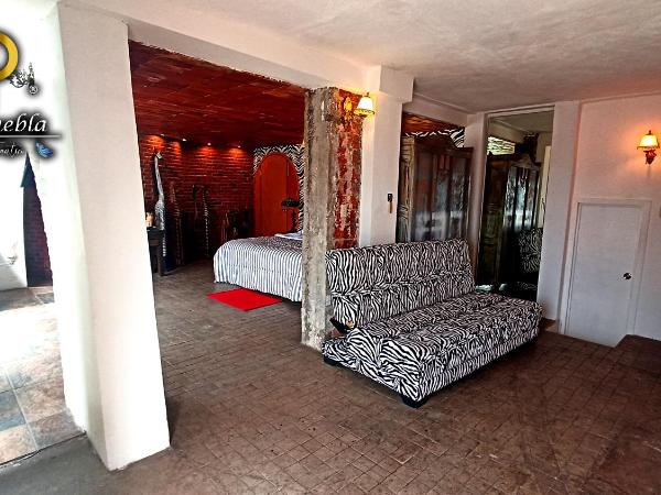 Hotel Temático Casa Puebla : photo 4 de la chambre chambre lit king-size - vue sur montagne