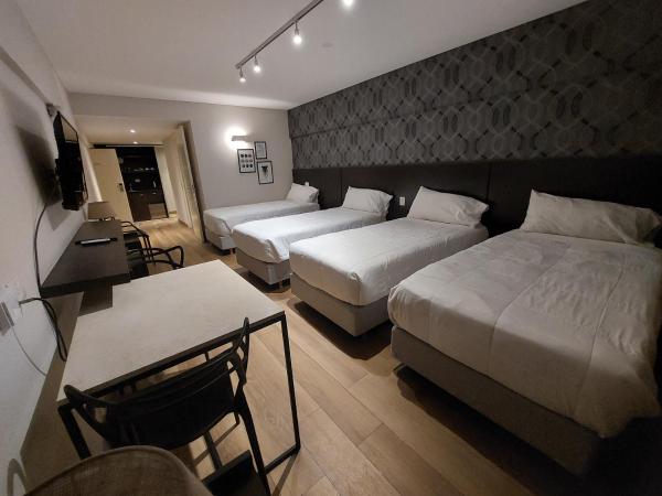 Avellaneda Aparts & Suites : photo 2 de la chambre chambre quadruple