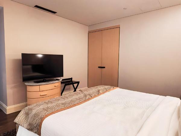 Ascott Raffles Place Singapore : photo 5 de la chambre suite malcolm