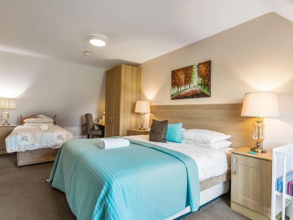 Tollyrose Country House : photo 1 de la chambre grande chambre double ou lits jumeaux