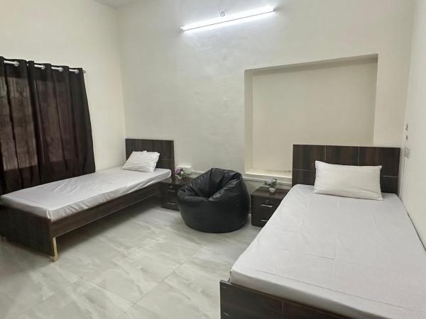 Elite stays : photo 2 de la chambre chambre lits jumeaux avec salle de bains privative