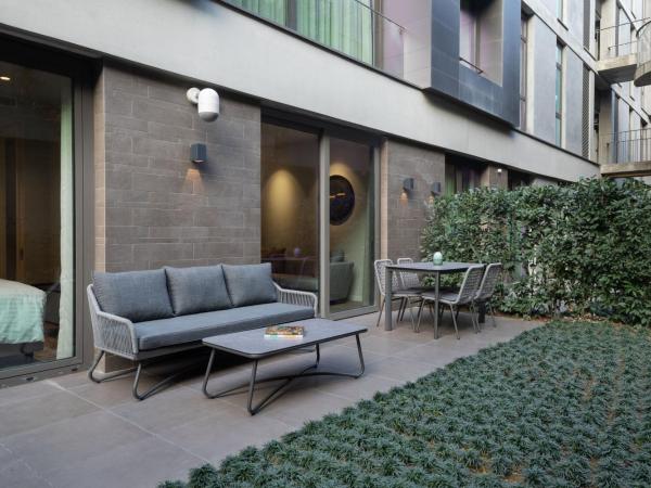 Marriott Executive Apartments Istanbul Fulya : photo 2 de la chambre appartement 1 chambre deluxe avec accès au jardin ou terrasse - vue sur ville